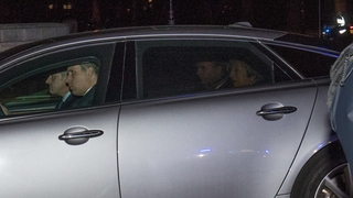 Theresa May returning to 10 Downing Street after her defeat in parliament