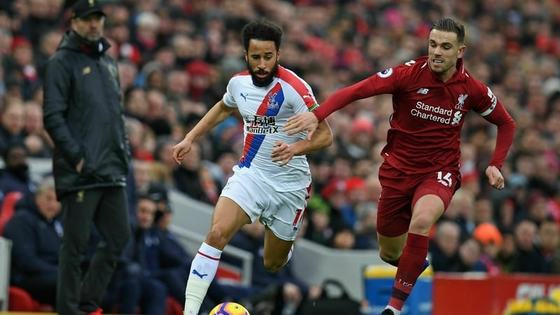 Andros Townsend in action against Jordan Henderson