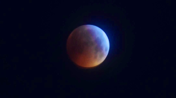 The surface of the moon has a reddish hue during the phenomenon (Pic: Peter Gallagher)