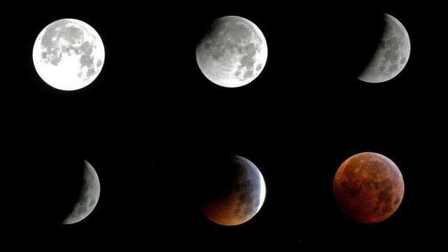 This combination of pictures shows the moon during different stages of the lunar eclipse in Sintra, Portugal, early today