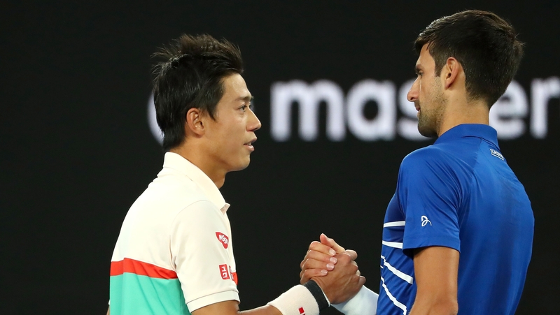 Novak Djokovic and Kei Nishikori at the end of the match