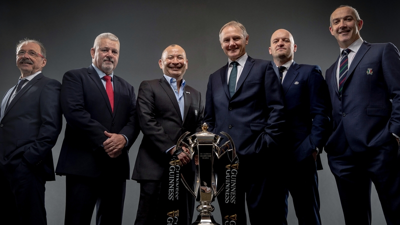 Keep your enemies close: Joe Schmidt poses with his rival coaches