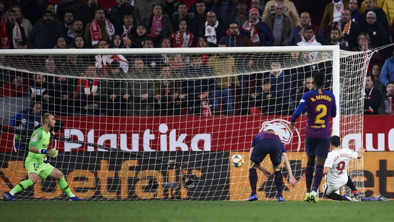 Wissam Ben Yedder slips home Sevilla's second goal against Barcelona