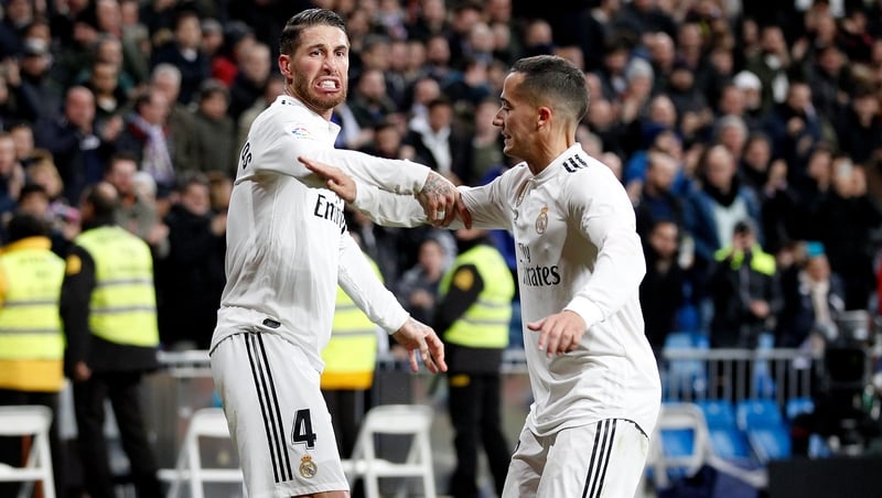 Goal scorer Sergio Ramos is congratulated by team-mate Lucas Vasquez