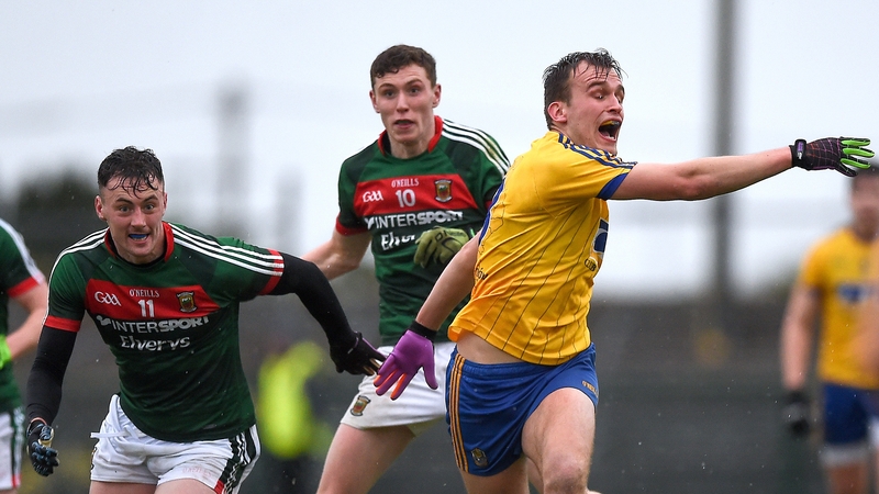 Roscommon's Enda Smith with Diarmuid O'Connor and Fionn McDonagh of Mayo