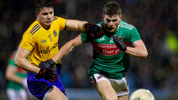 Mayo's Eoin O'Donoghue with Conor Daly of Roscommon