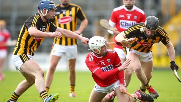 Kilkenny's Billy Ryan and Enda Morrissey tackle Luke Meade of Cork