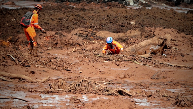 Search efforts were paralysed for much of the day on fears another dam could give way