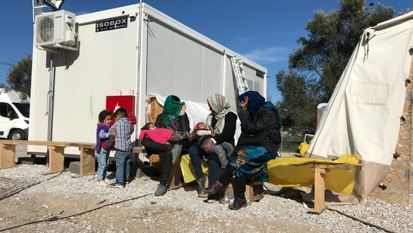 Children waiting at the clinic with their parents