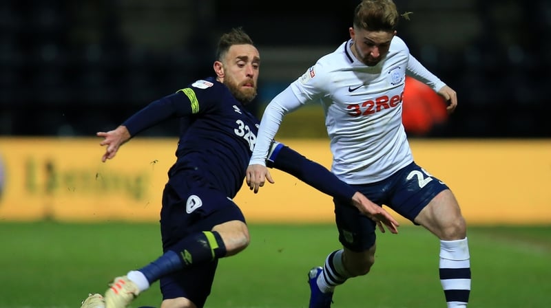 Richard Keogh of Derby County tackles his international team-mate Sean Maguire
