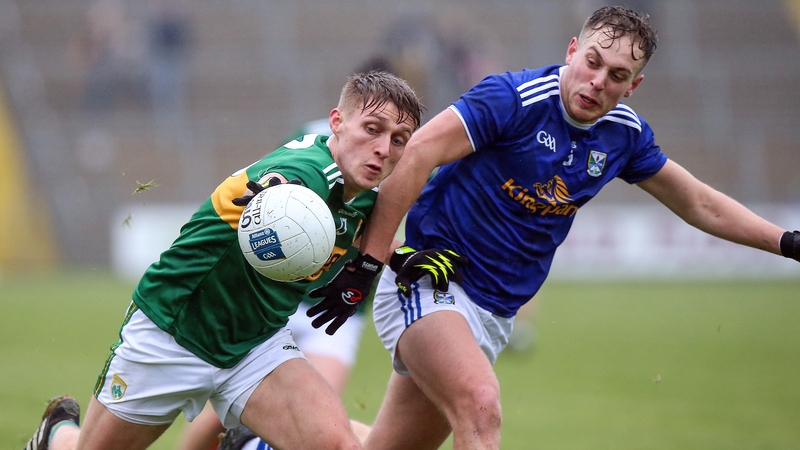 Kerry's Killian Spillane gets to the ball ahead of Cavan's Padraig Faulkner