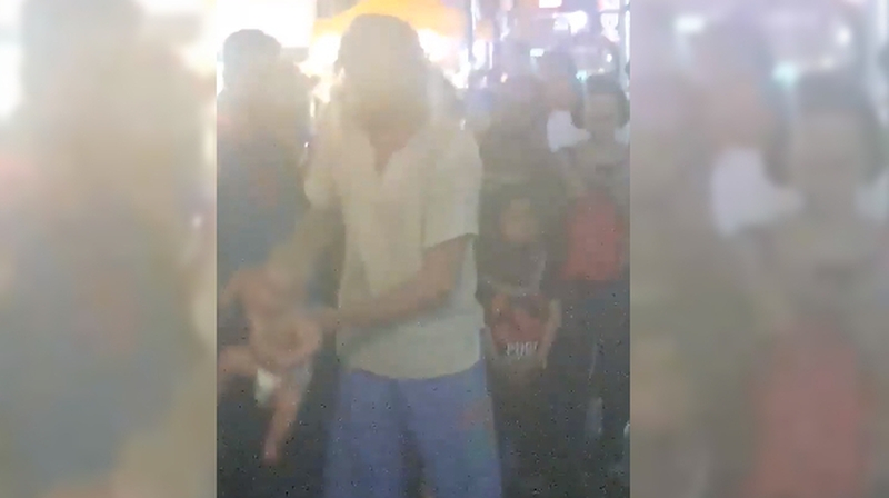 The buskers were picked up after trying to woo spectators in Kuala Lumpur (pic: Facebook - zac.abdulcheah)