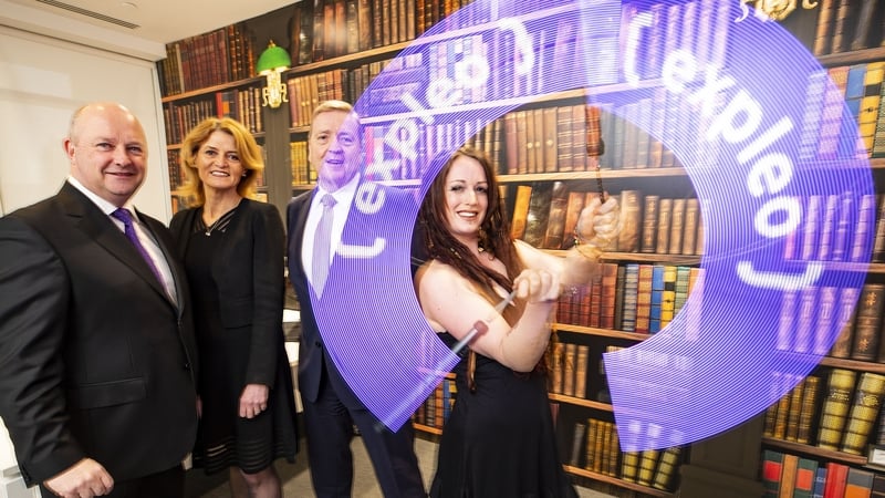 Phil Codd, Expleo Ireland, Mary Buckley, IDA Ireland and Minister of State, Pat Breen, pictured with Luna, Digital Fire Art Performer at the Expleo announcement (Credit: Leonard Photography)