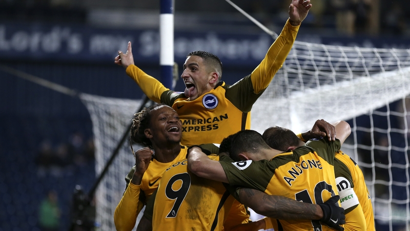 Glenn Murray of Brighton & Hove Albion celebrates with his team mates