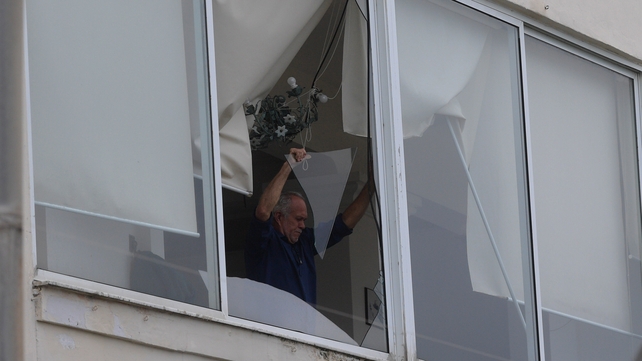 The storm damaged homes and brought down trees