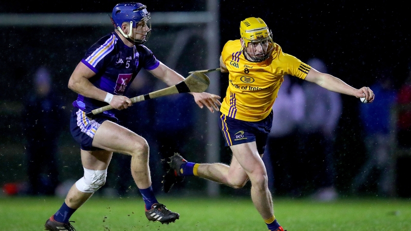 DCU's Aaron Maddock is pursued by David Keogh of DIT