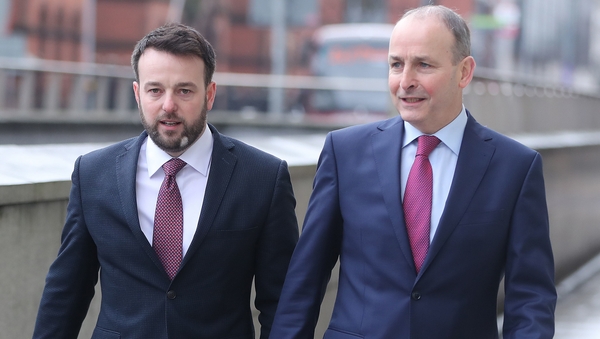 Colum Eastwood (L) and Micheál Martin at a previous meeting in January