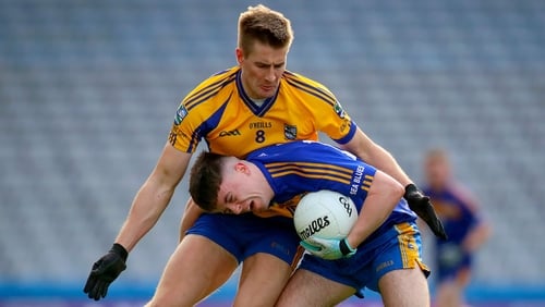 Dylan Sloyan with Nathan Breen in action