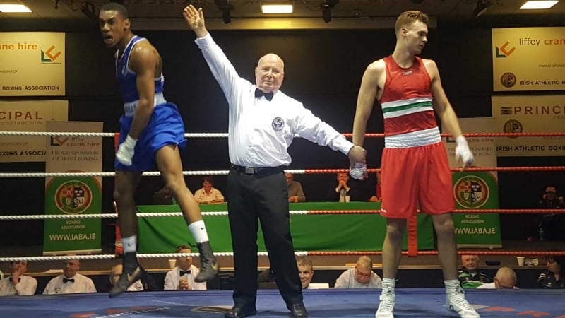 Gabriel Dossen (Blue) celebrates his victory over Michael Nevin