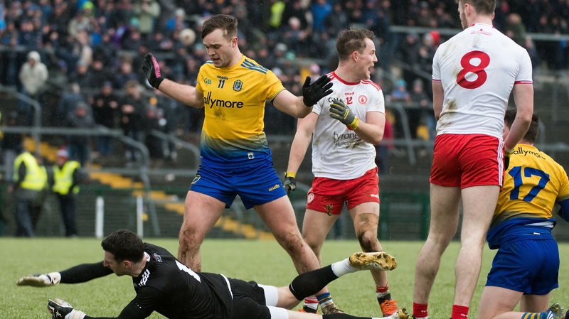Niall Morgan hits the deck after a push from Ultan Harney
