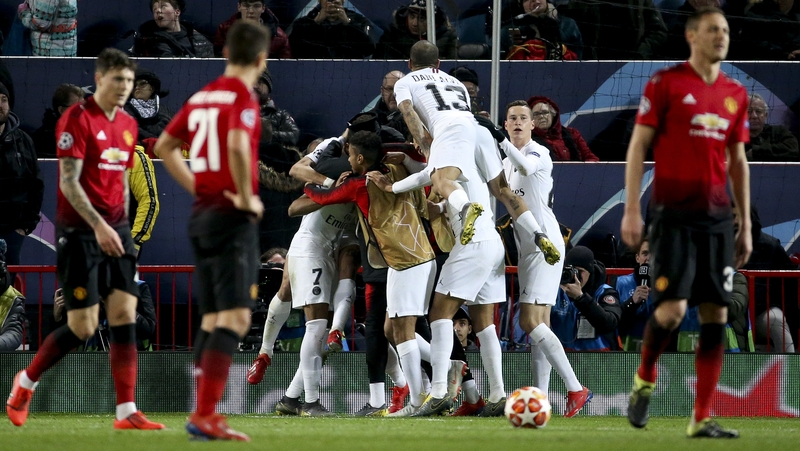 United players look on as PSG celebrate