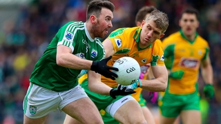 Corofin's Kieran Fitzgerald with Niall O'Frighil of Gaoth Dobhair