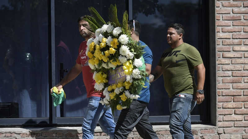 Residents in the town of around 2,500 people arrived early this morning to pay their last respects