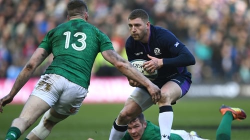 Finn Russell in action against Ireland on 9 February