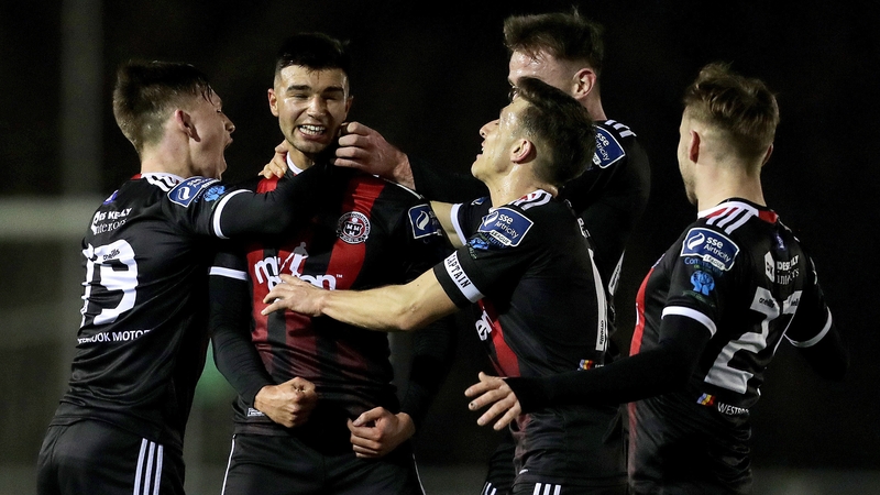 Danny Mandroiu celebrates scoring a goal with teammate