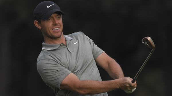 Rory McIlroy is two shots behind leader Dustin Johnson