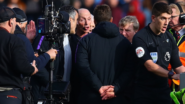 Tottenham Hotspur manager Mauricio Pochettino confronts referee Mike Dean after the game