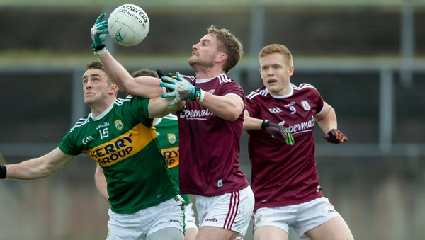 Galway's Gary O'Donnell battles with Stephen O'Brien of Kerry