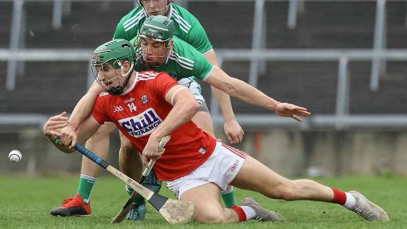 Limerick's Sean Finn and Aidan Walsh of Cork