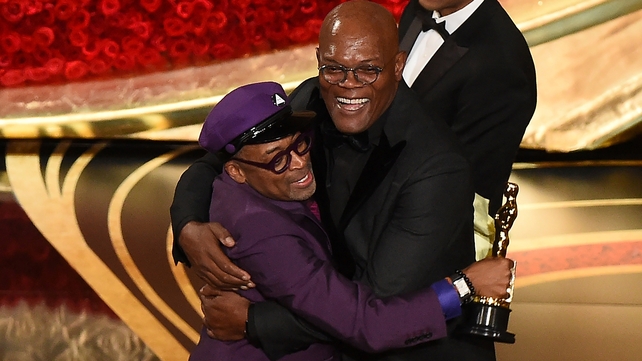 Best Adapted Screenplay - BlacKkKlansman. Spike Lee (pictured with awards presenter Samuel L Jackson), Charlie Wachtel, David Rabinowitz and Kevin Willmott