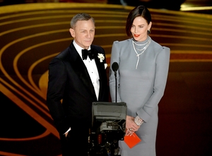 Daniel Craig was typically sleek in a black Tom Ford creation