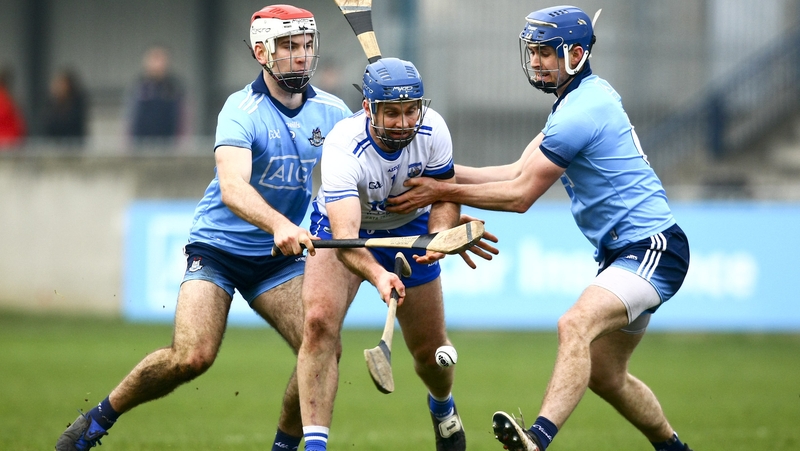 Waterford's Michael 'Brick' Walsh is tackled by Dublin's Paddy Smyth and Sean Moran