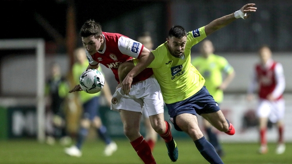 Kevin Toner and Nathan Boyle tussle for the ball in tonight's encounter in Inchicore
