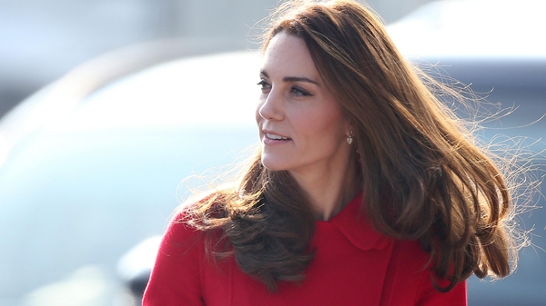 The Duchess of Cambridge chose a favourite red coat for today's event in Belfast.