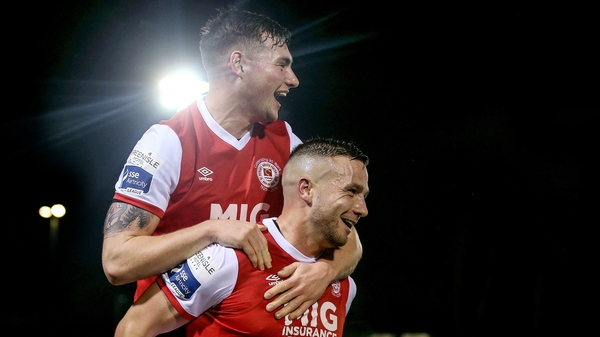 Mikey Drennan celebrates scoring a goal with Kevin Toner
