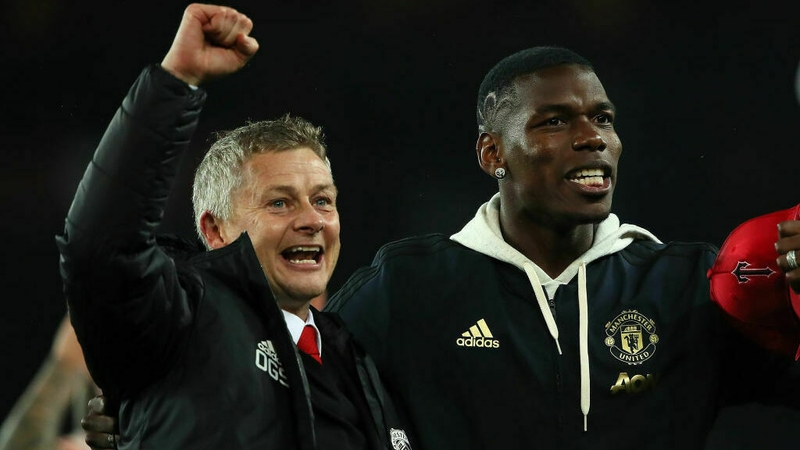 Ole Gunnar Solskjaer (L) celebrates with Paul Pogba