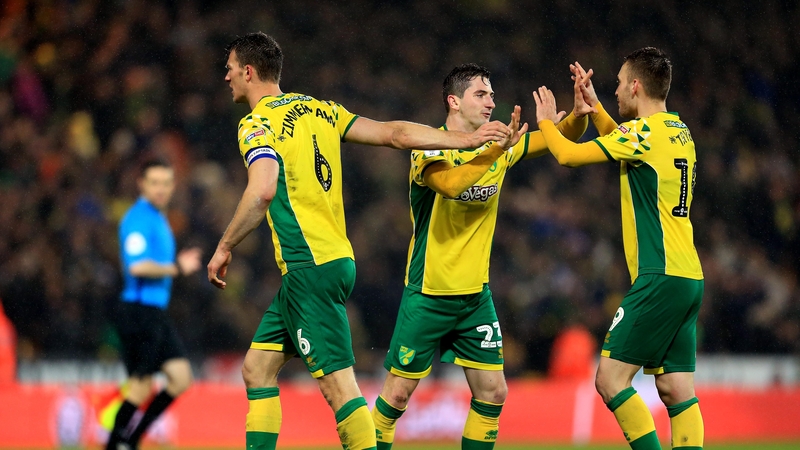 Norwich players celebrating at the final whistle.