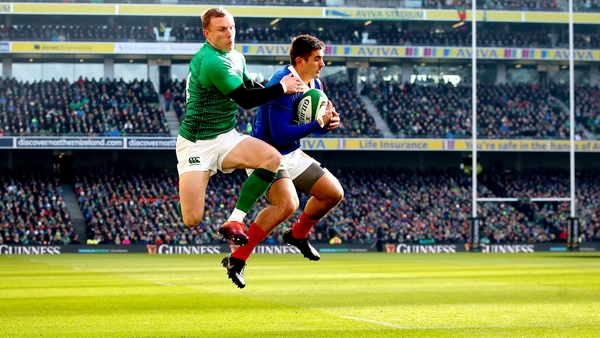 Keith Earls and Thomas Ramos take to the skies at the Aviva Stadium