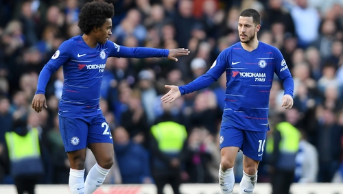 Eden Hazard of Chelsea is congratulated by team-mate Willian