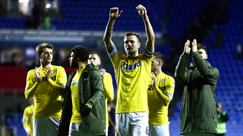 Leeds players celebrate their 3-0 win at Reading