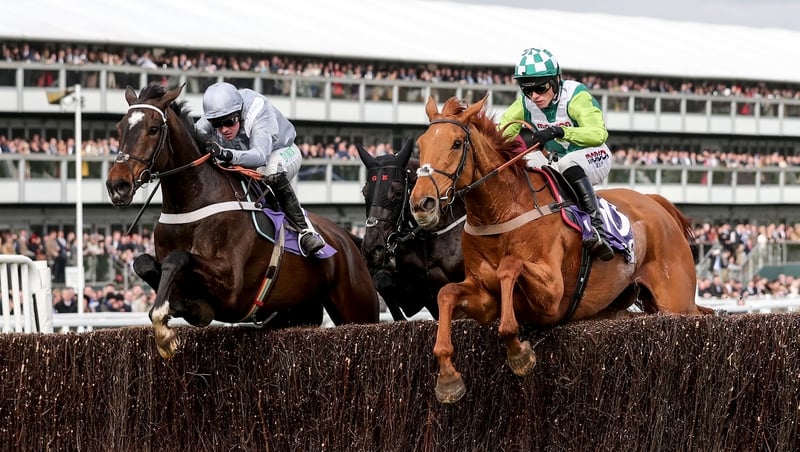 Harry Cobden on Topofthegame (R) wins ahead of Nico de Boinville on Santini