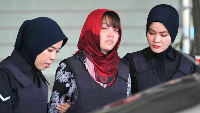 Doan Thi Huong (C) broke down in tears in court