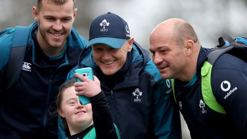 Will Addison (L), Joe Schmidt and Rory Best with Ireland fan Jennifer Malone