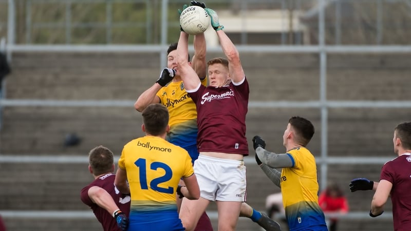Gary O'Donnell and Tadhg O'Rourke challenge for the ball in the air