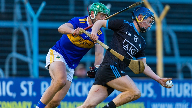 Dublin's Oisin O'Rorke (R) is pursued by James Barry
