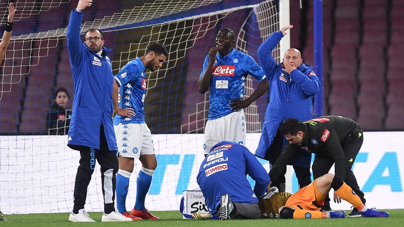 David Ospina lies unconscious